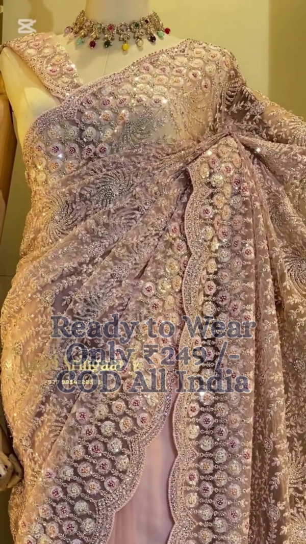 Regal Lavender Heavy Embroidered Designer Net Saree with Ready-to-Wear Draping and Intricate Handwork Detailing – Ideal for Weddings, Receptions & Special Occasions”
