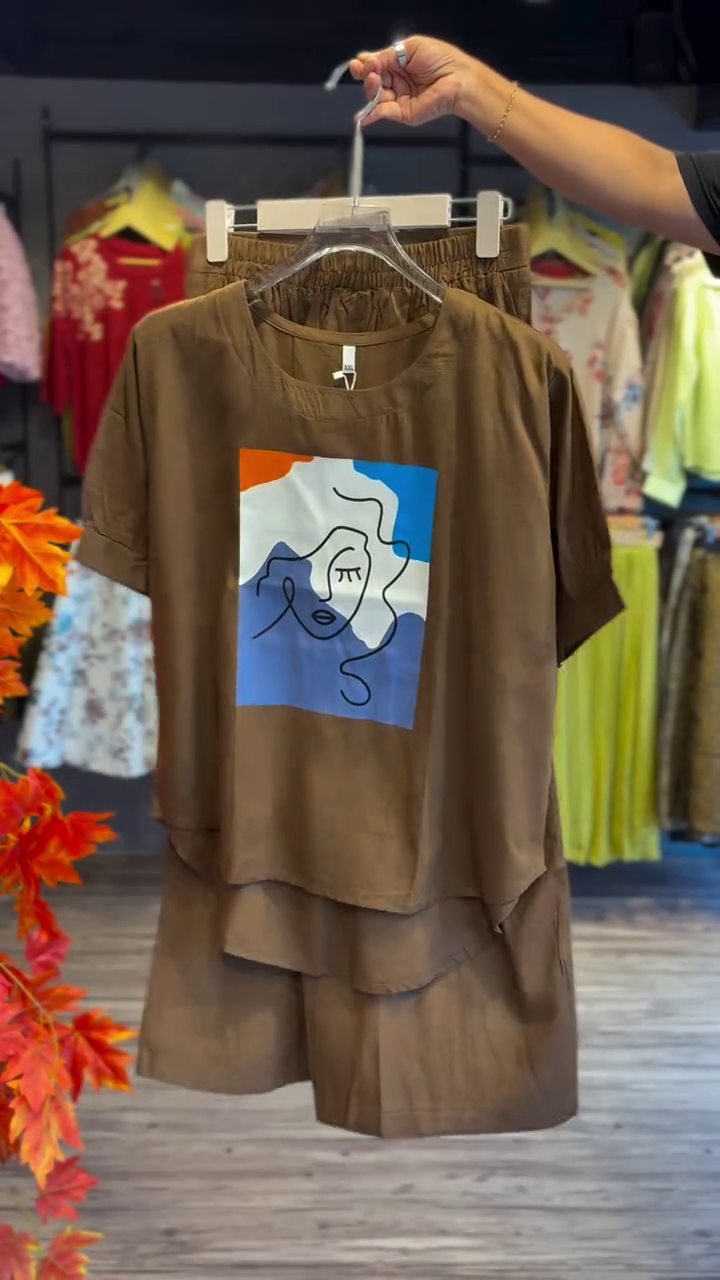 Brown Two-Piece Set with Abstract Face Print 🎨👗