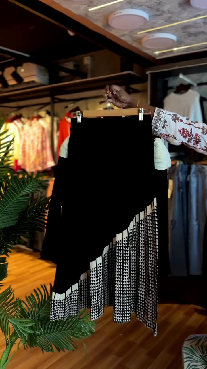 Designer Black and White Checkered Pleated Mini-Skirt with Floral Appliqué Collar - Image 2