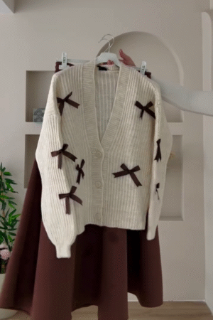 🎀 "Classic Romantic Ribbed Pearl Off-White Cardigan Embellished with Vintage Brown Bows for Lovers of Soft Feminine Dreamy Outfits" 🎀​