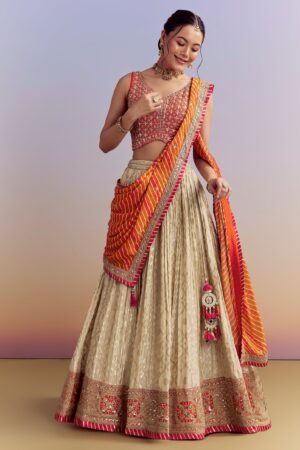 Beige Brocade Lehenga with Orange Leheriya Dupatta