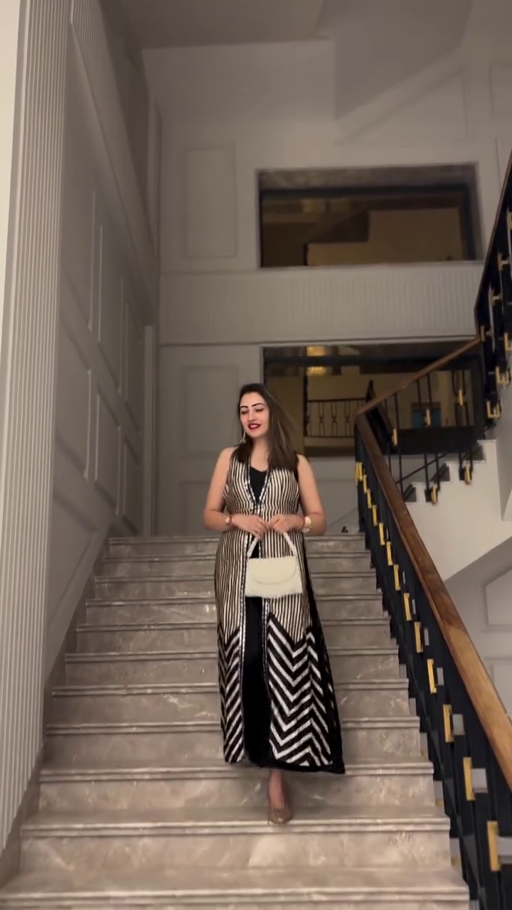 “Black & Ivory Sleeveless Long Jacket Kurta with Chevron Panel Detailing and Straight Inner Dress for Evening & Party Wear” ✨