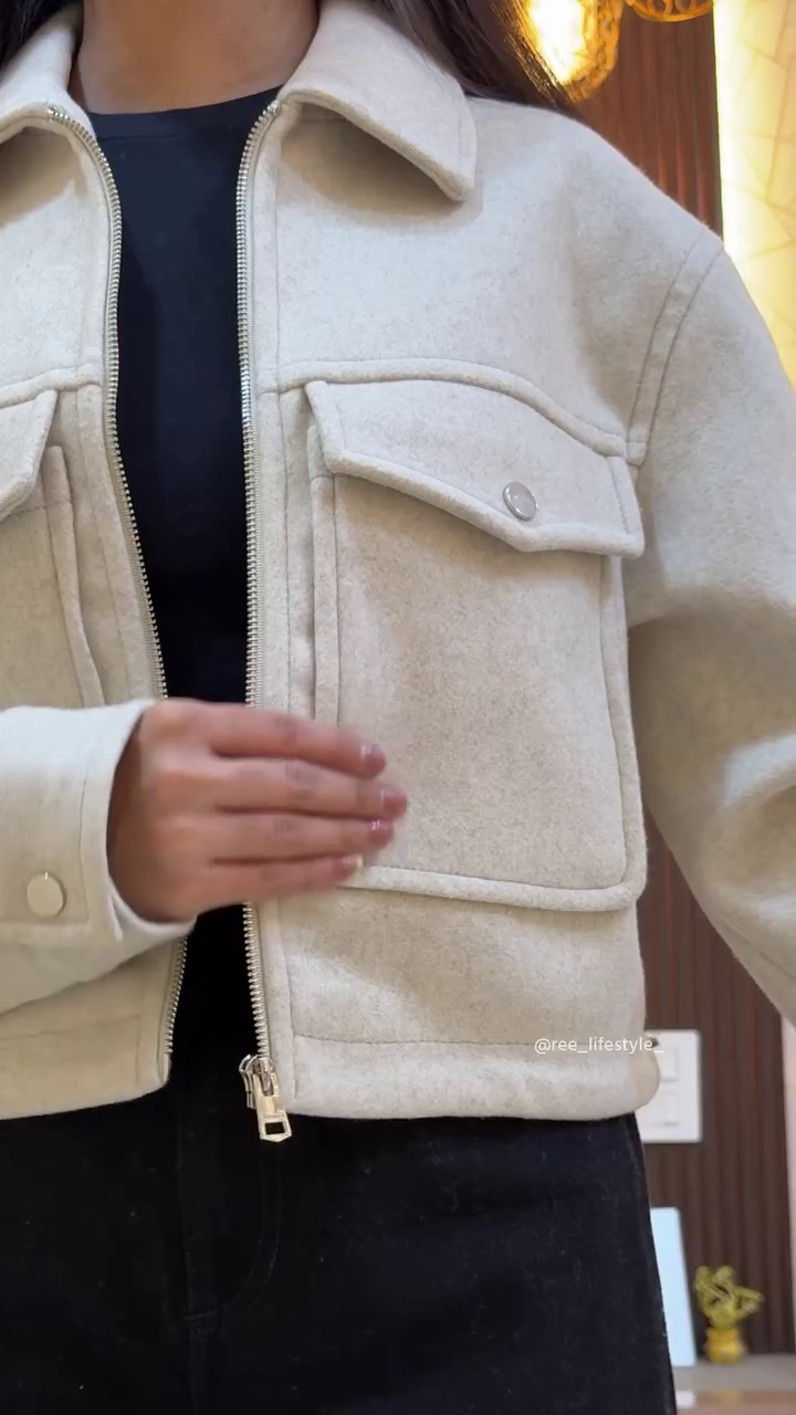 Beige Cropped Zip‑Up Utility Jacket with Front Flap Pockets Styled with Black High‑Waist Wide‑Leg Pants for Street‑Chic Winter Outfit” 🤍 - Image 2