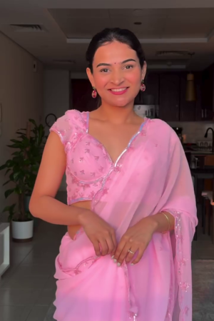 Blush Pink Lightweight Saree with Embroidered Border and Coordinated Cap‑Sleeve Designer Blouse for Parties & Weddings” 🌸