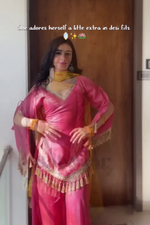 Hot Pink Flared Short Kurta with Tassel‑Trim Hem, Matching Sharara Pants and Dupatta Festive Suit Set” 🌸